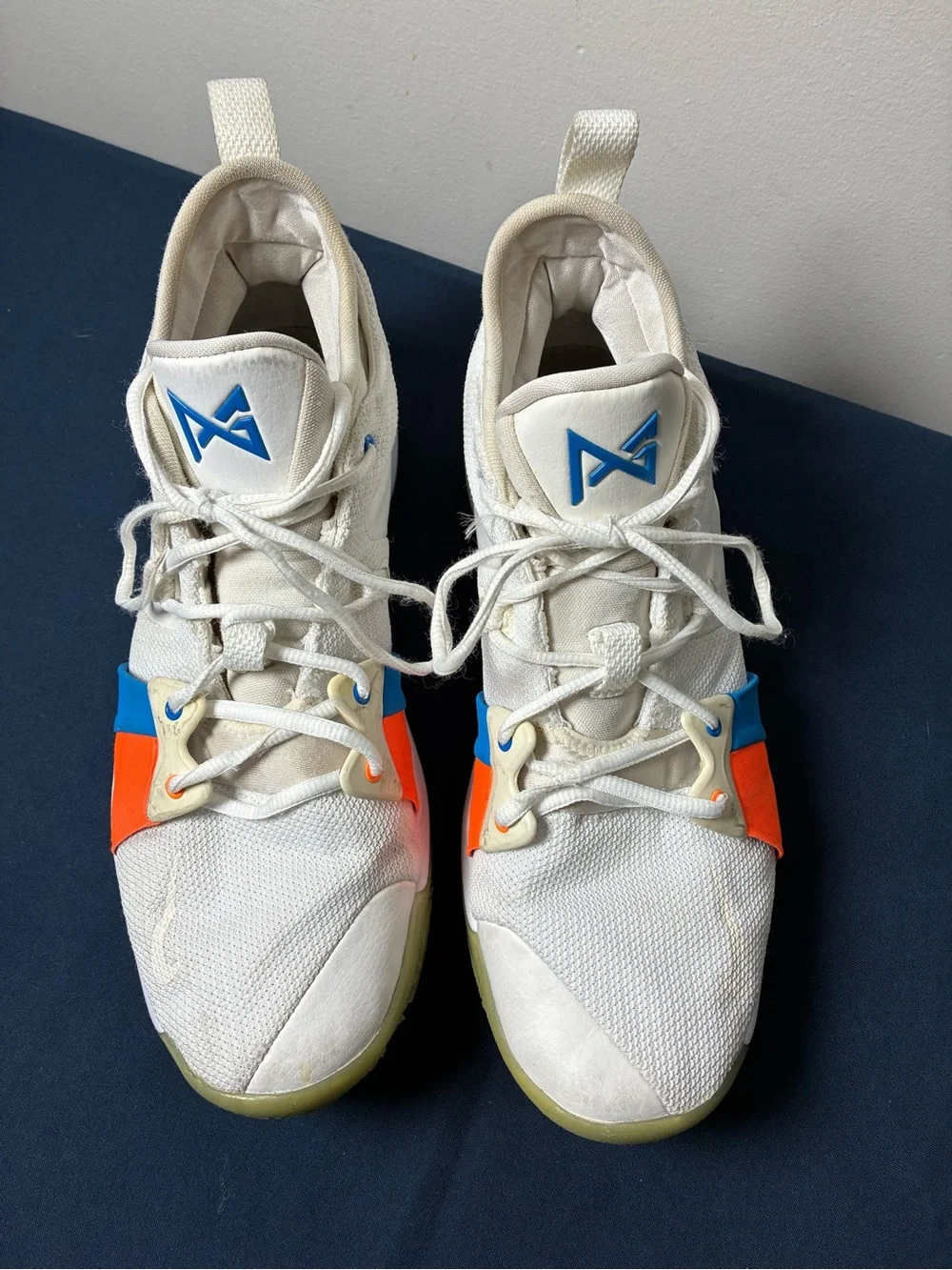 Nike White Youth Athletic Sneakers with Blue & Orange Accents